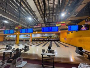 Wide view of the bowling lanes and scoreboard during SUKTEM Bowling 2026.